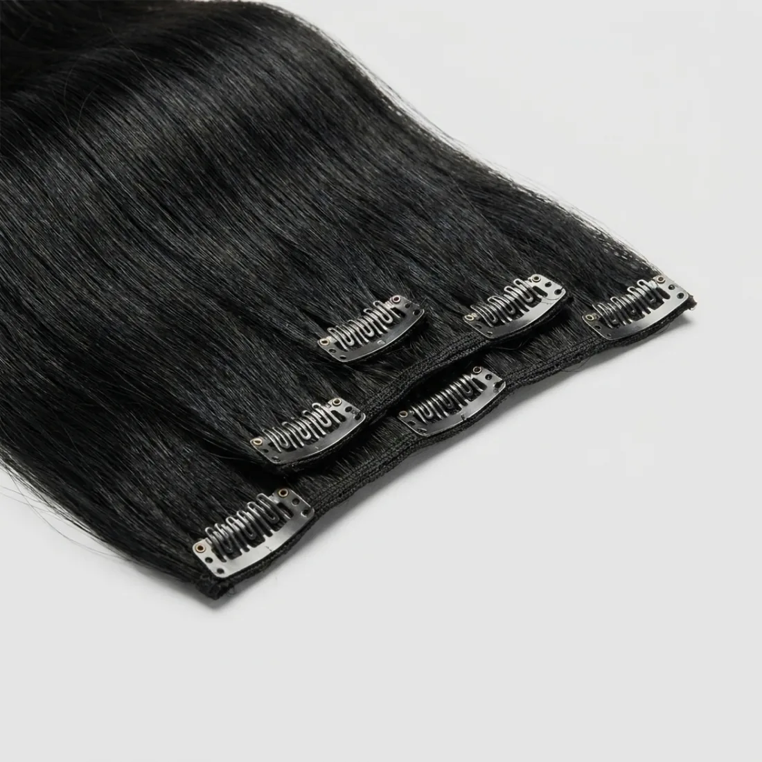 Clip-in weft with snap clips