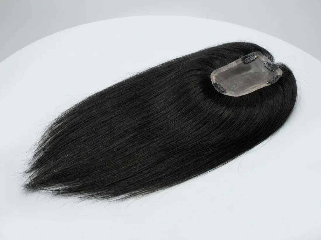 Women's monofilament hair topper with pressure clips